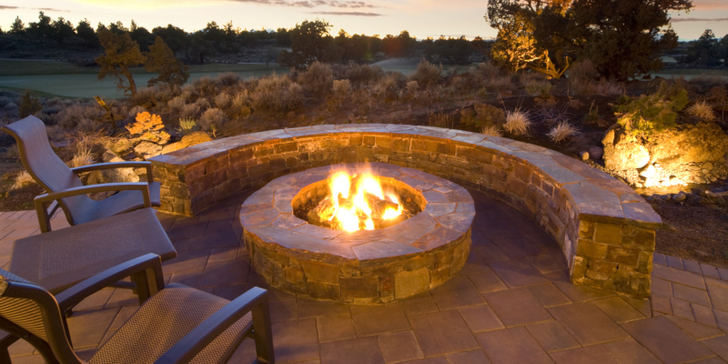 Outdoor fire pits offer many practical uses